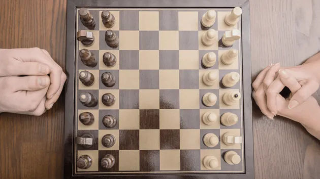 Chess board and pieces in rules for playing chess